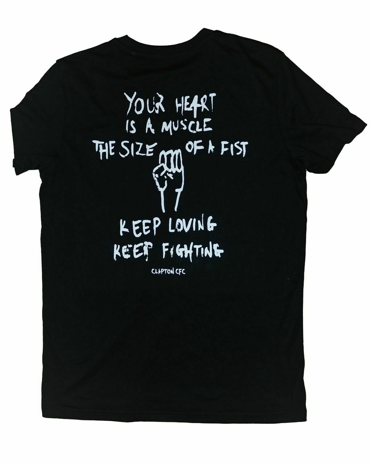 A black t-shirt with scrwled text saying: your hears is a muscle th size of a fist. keep loving, keep fighting