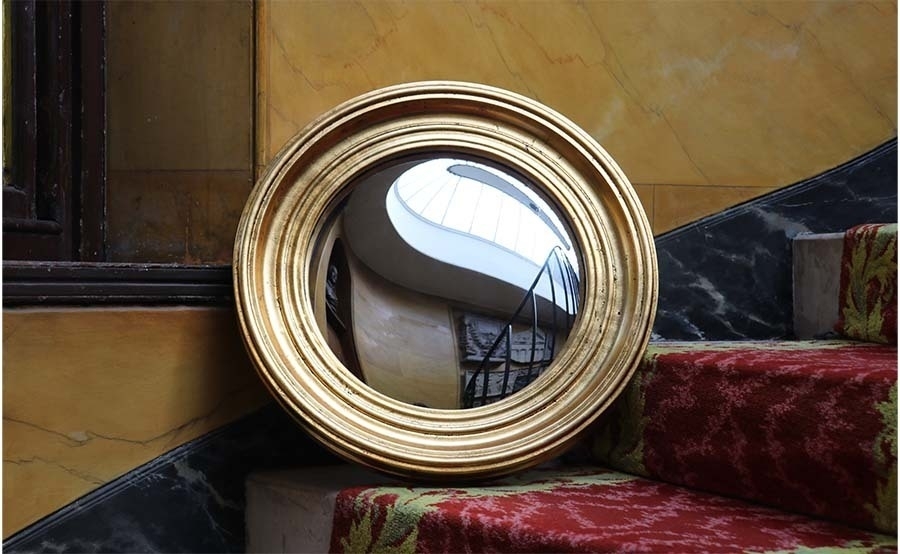 A large circular convex mirror