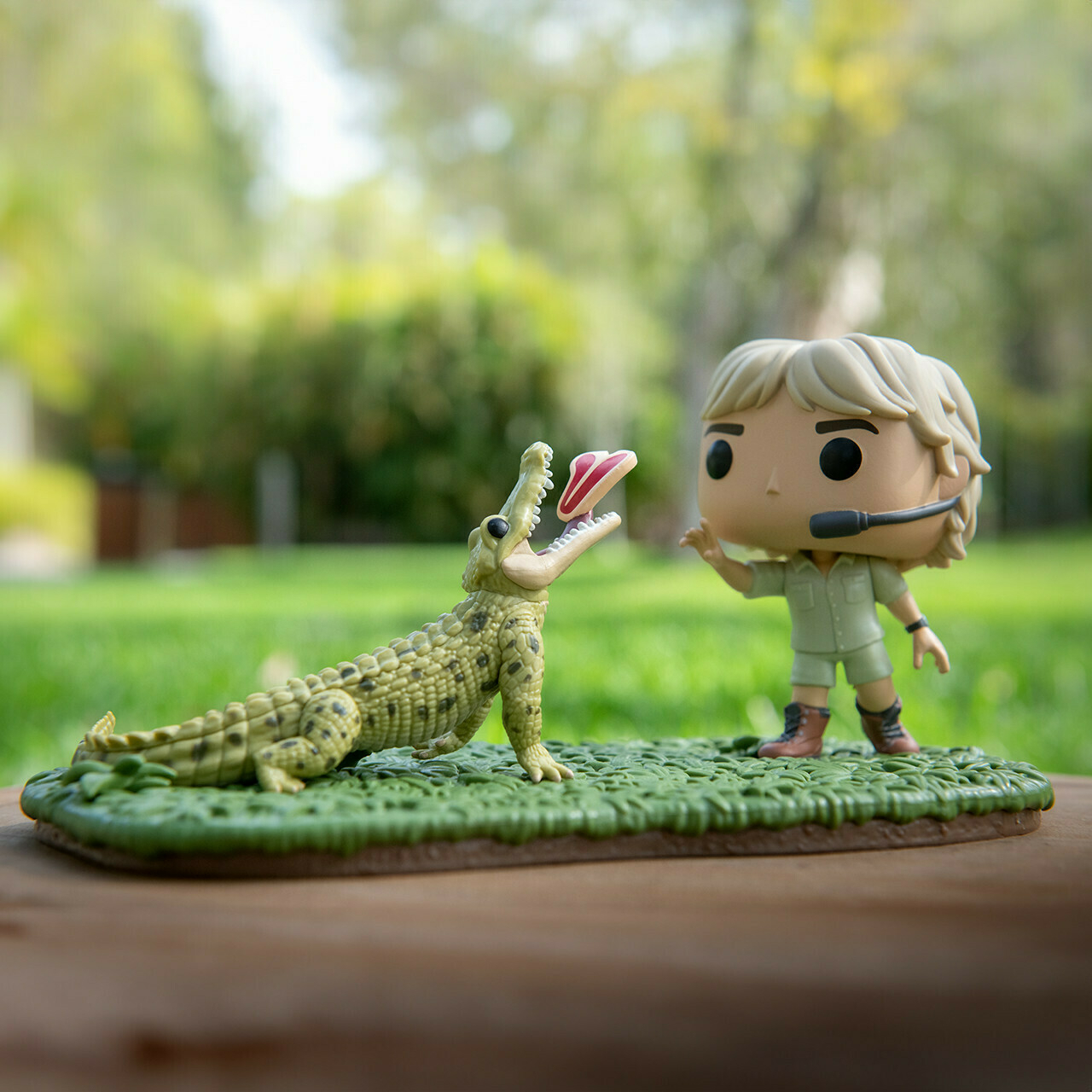 Pop Vnyl of Steve Urwin feeding a croc