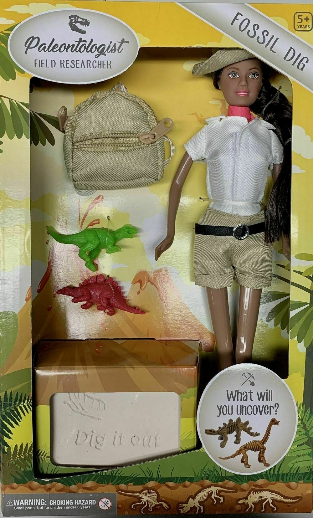 A paleontologist doll with mini dinosaurs and a clay brick containing mini replica dinosaur bones