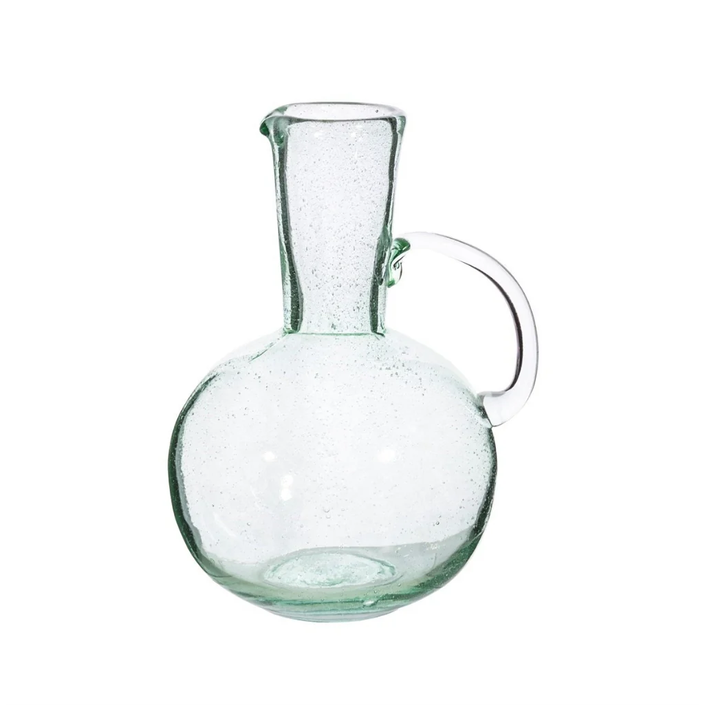 A glass jug with a very round base and a long neck
