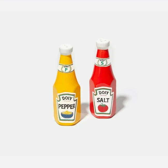 Red and yello salt and pepper pots in the shape of ketchup bottles