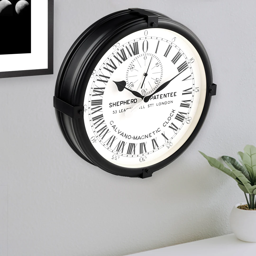 An analogue wall clock with a 24 hour face
