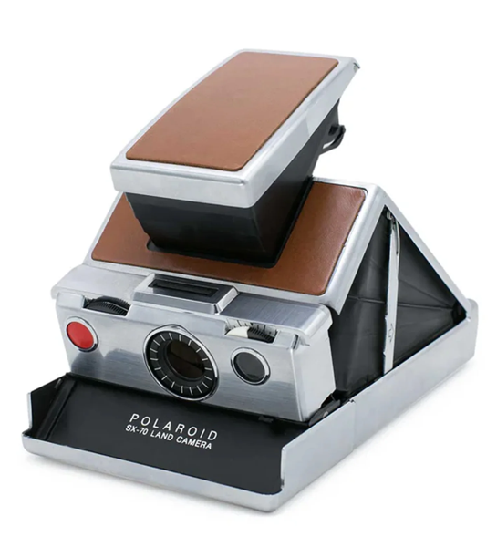 A Polariod SX70 camera