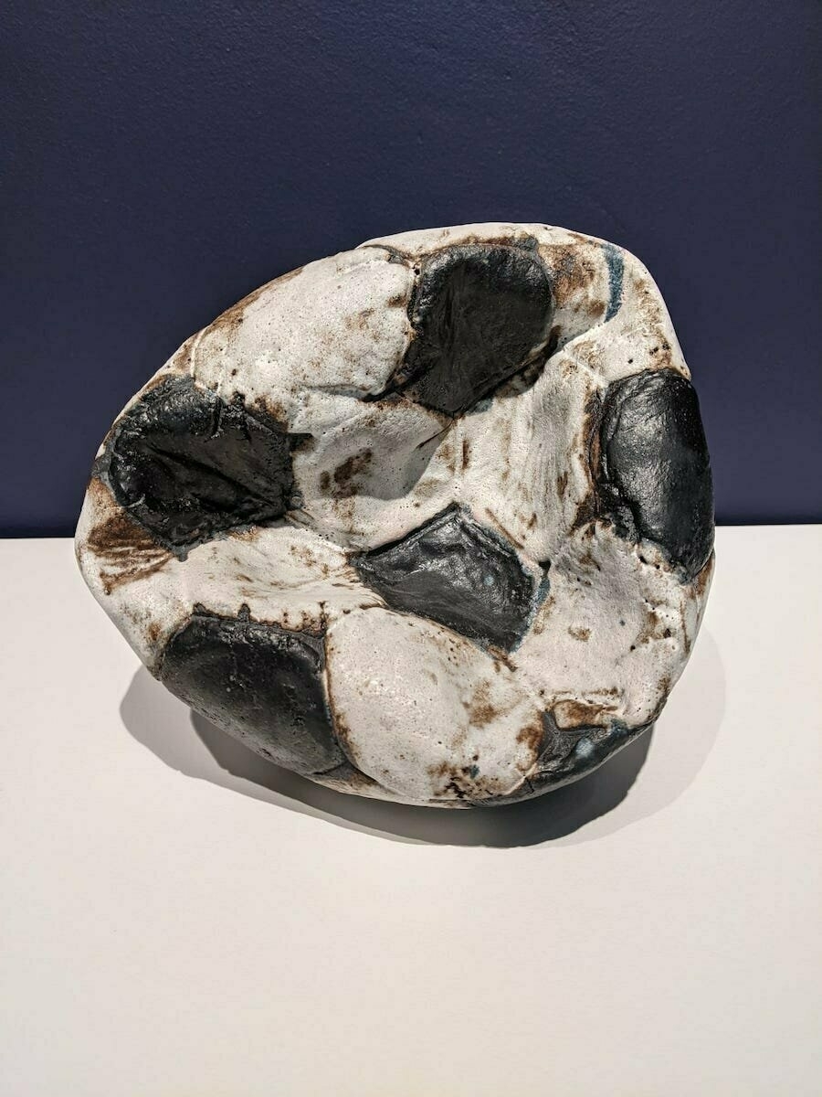 Ceramic football by Marcus Harvey