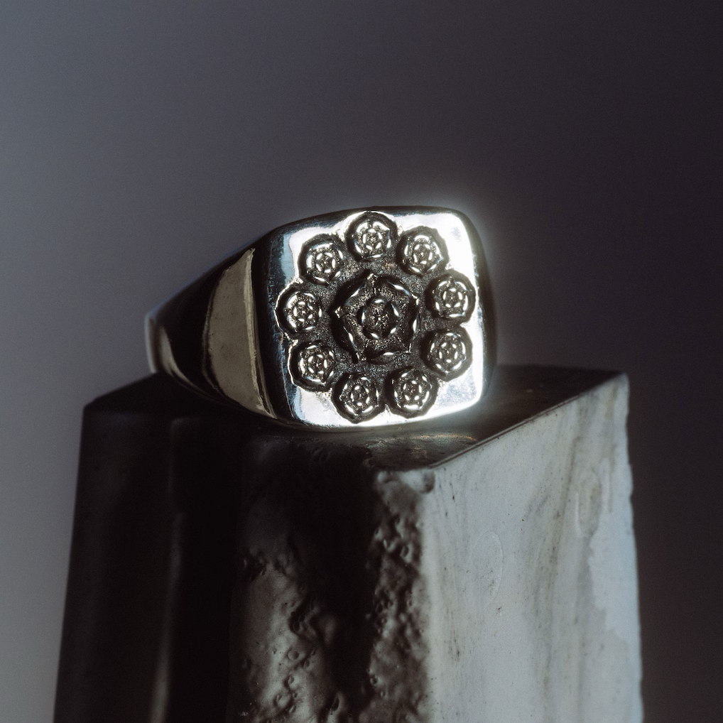 england-x-bazanetti-ten-roses-signet-ring-sterling-silver_ss5_p-203141036+pv-1+u-a3bc6vtgjjirlsipfw3g+v-lzasynd9rnenkh3d7h9l.jpg.png England X Bazanetti Ten Roses Signet Ring - Sterling Silver